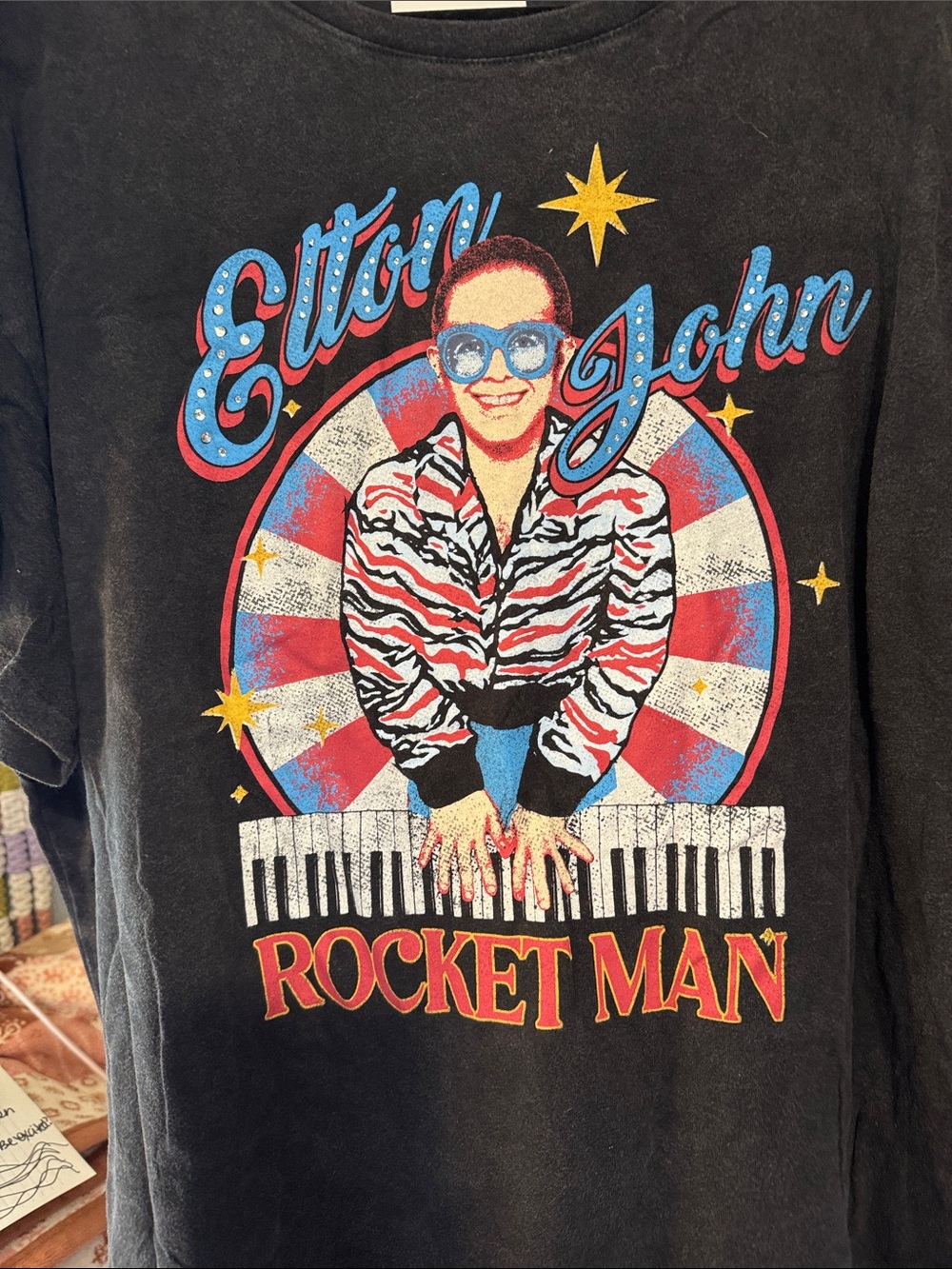 Woman’s Elton John Rocket Man Graphic Tee - Black with Red & Blue
